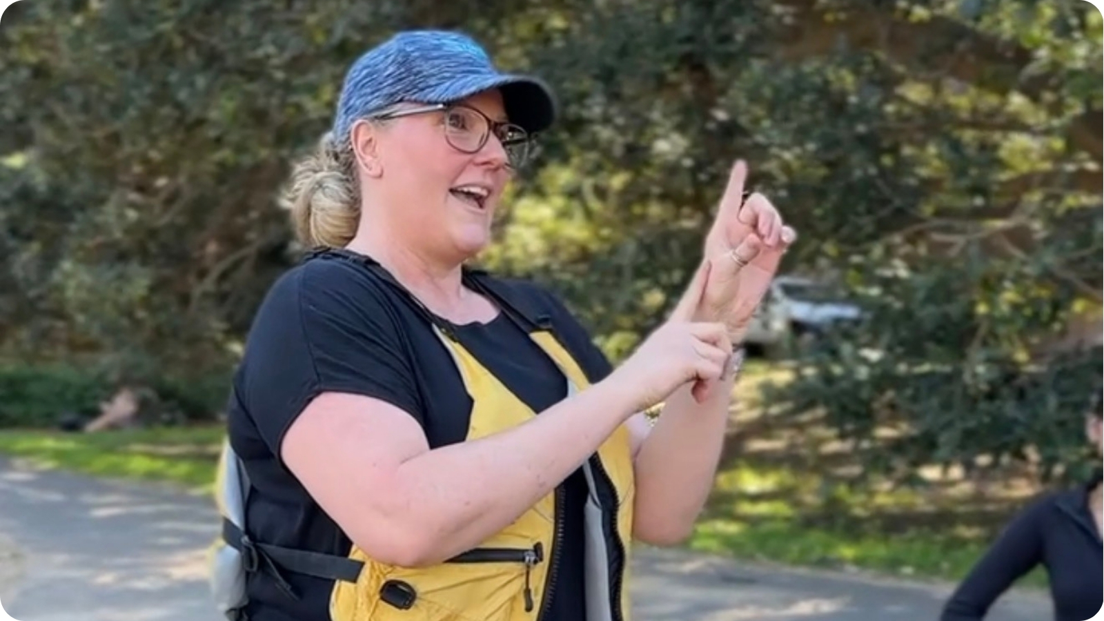 Sydney By Kayak Auslan guide signing during a tour briefing