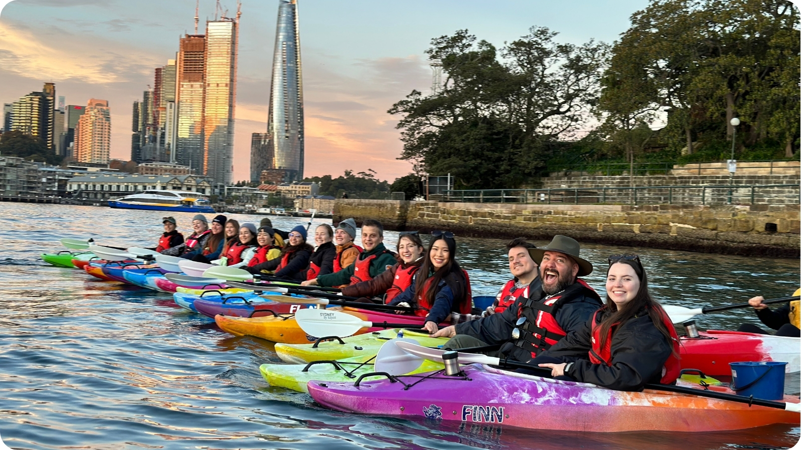 A large group of paddlers from Sea Life gathered on Sydney Harbour for a World Oceans Day event.